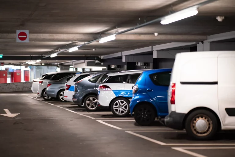 Vehicles parked in parking lot